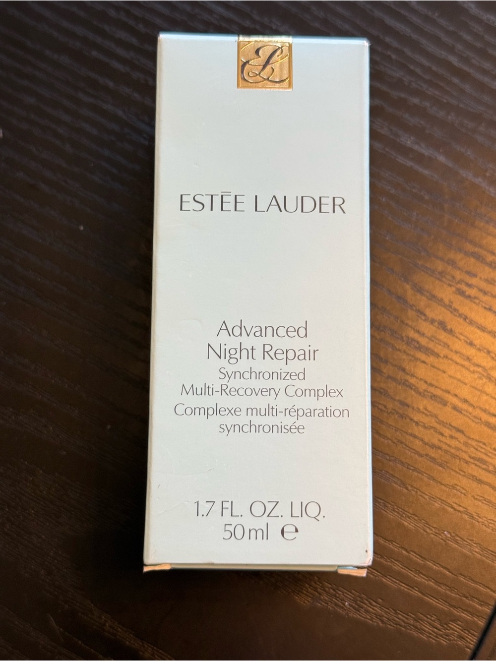 Estee Lauder Advanced Night Repair Serum in Gold and Cream Packaging